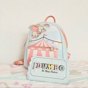 Disney Loungefly Dumbo backpack with matching wallet.